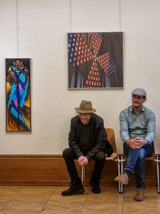 Axel Neumann und Daniel Ackermann mit ihren Werken (Füllermalerei und 3D-Visualisierung)